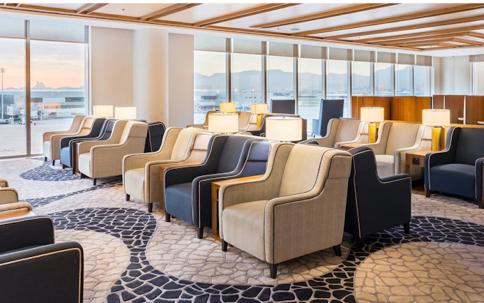 Seating area in Plaza Premium Lounge at Rio de Janeiro Airport, T2, with runway view.
