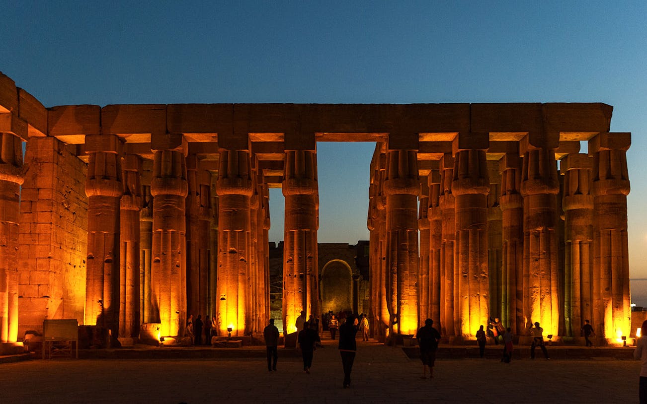 Karnak Temple illuminated during sound and light show, Luxor, Egypt.