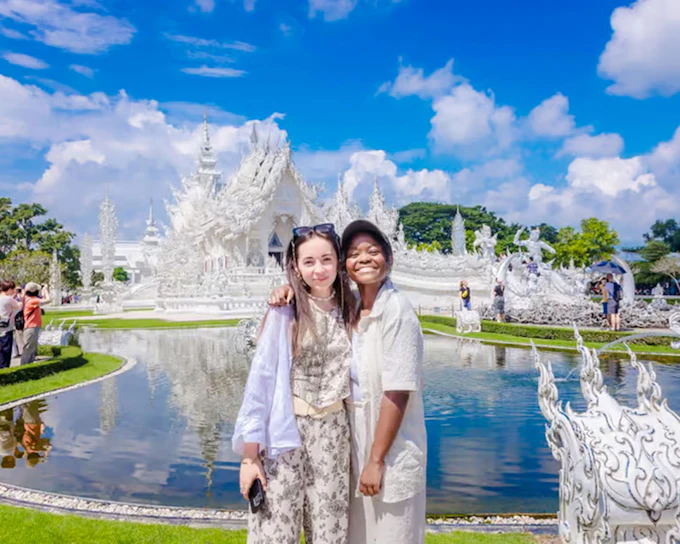 From Chiang Mai: Hot Springs and Chiang Rai White, Black & Blue Temple Day Tour with Lunch & Hotel Transfers