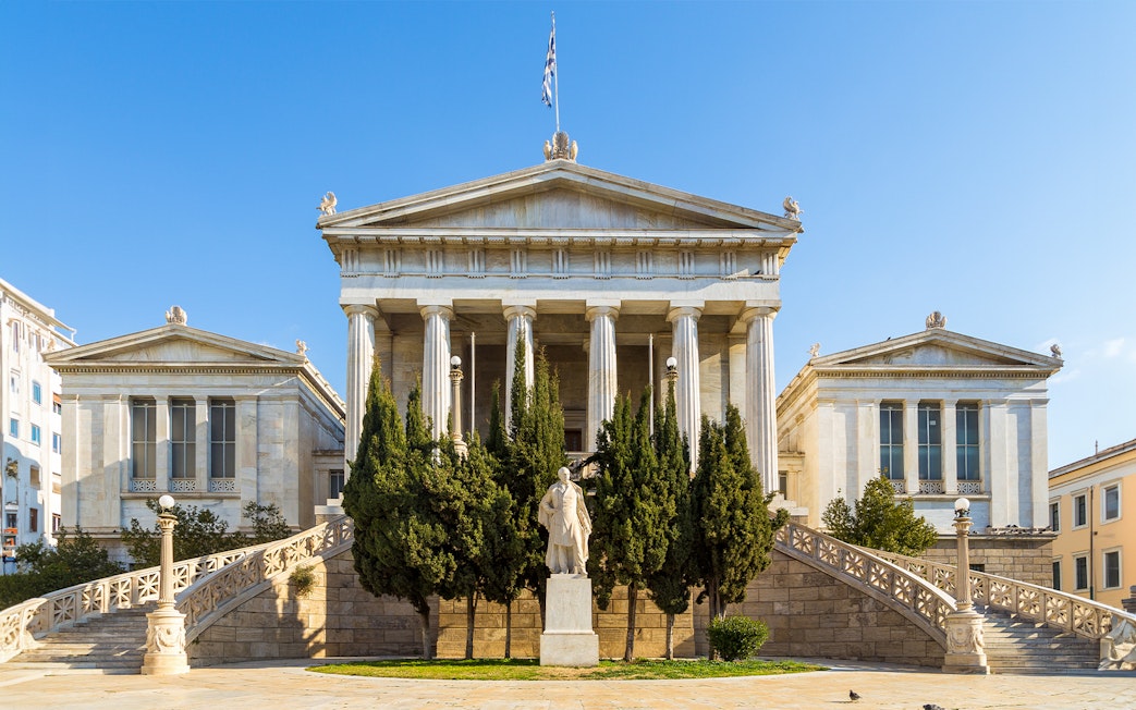 Neoclassical building with columns in Athens, Greece, seen on Hop-on Hop-off tour.