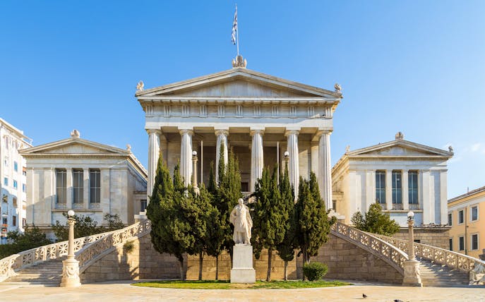 Neoclassical building with columns in Athens, Greece, seen on Hop-on Hop-off tour.