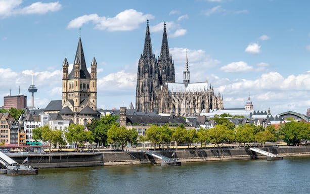 Cologne Cathedral and Old Town skyline viewed from the Rhine River.