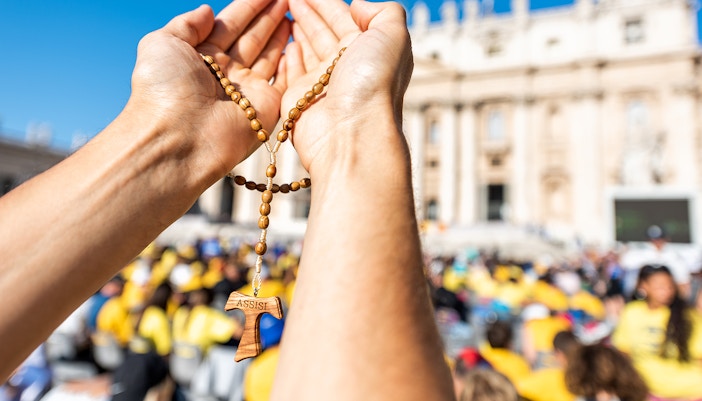 Pilgrim at St. Peter's Basilica, Vatican City, during Jubilee 2025 event.