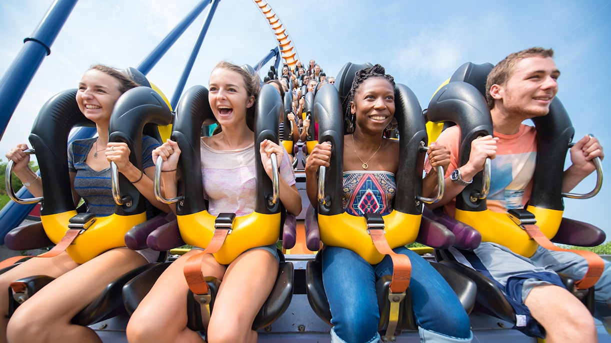 Riders enjoying the Dominator roller coaster at Six Flags King's Dominion.