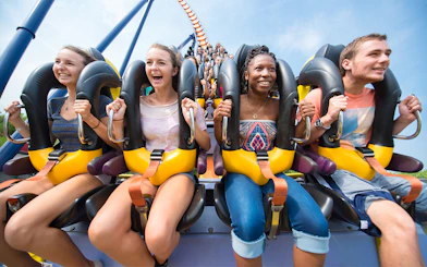 Riders enjoying the Dominator roller coaster at Six Flags King's Dominion.