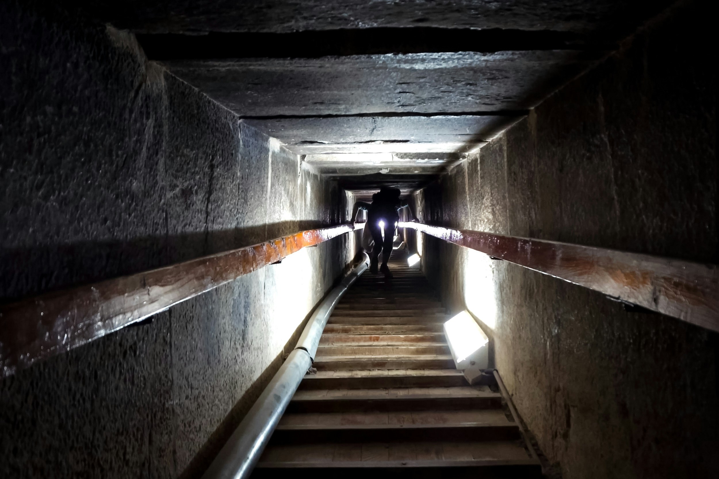 Narrow passageway leading to an ancient burial chamber.