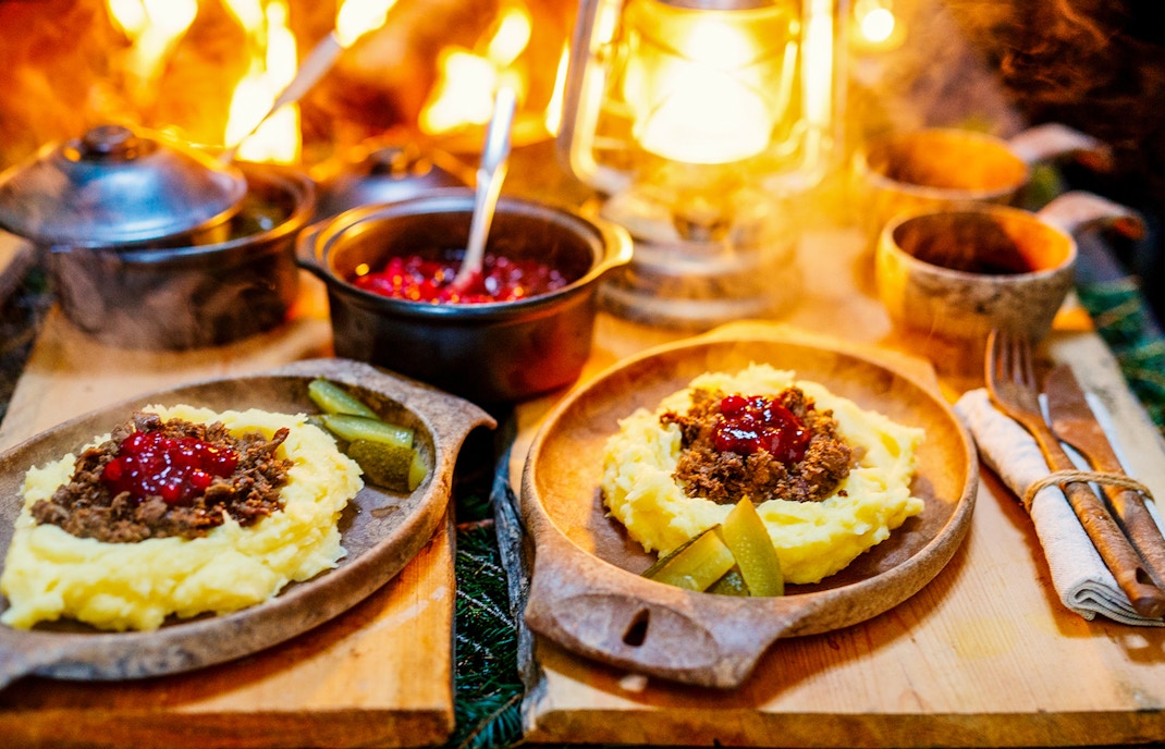 Traditional Finnish meal with mashed potatoes and lingonberry sauce at Santa Claus Village, Rovaniemi.