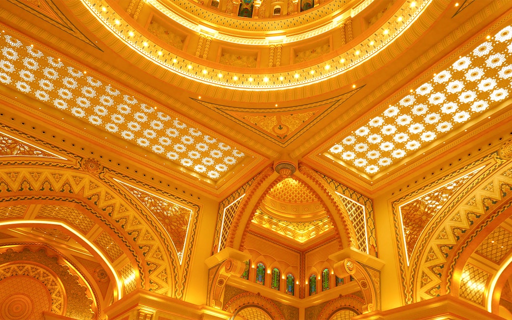 Ornate ceiling details of Qasr Al Watan in Abu Dhabi, showcasing intricate patterns and arches.