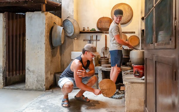 Visitors exploring Shophouse Living exhibit at Chinatown Heritage Centre.
