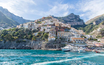Positano hillside view with colorful buildings from Amalfi Coast.