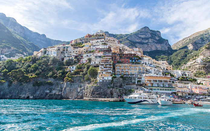 Positano hillside view with colorful buildings from Amalfi Coast.