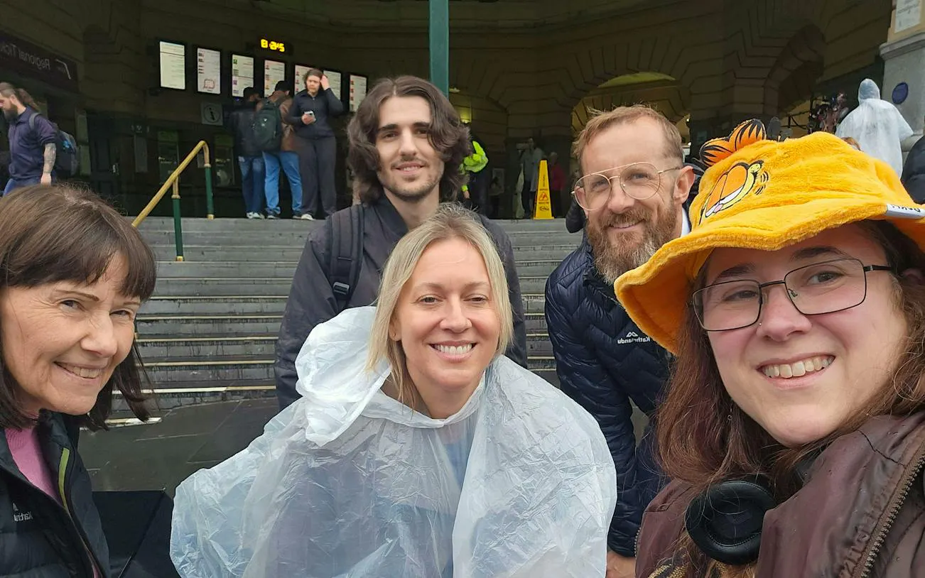 Group of people at Flinders Street Station, Melbourne, during the Forgotten Red Diamond city exploration game.