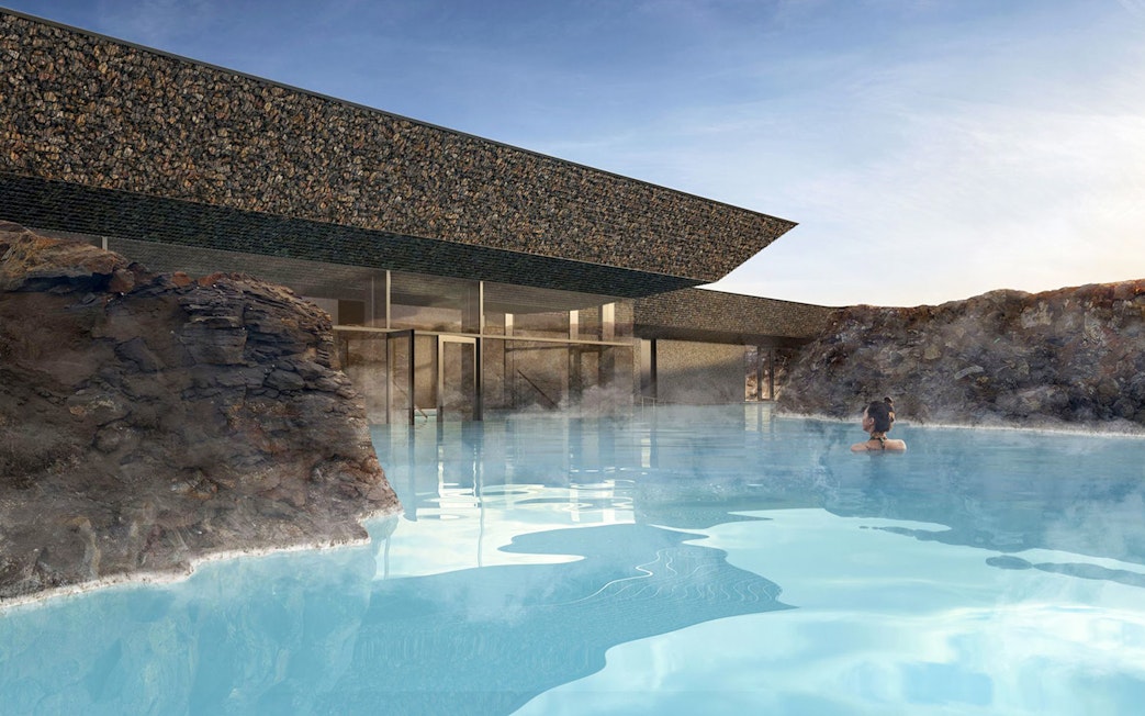 Guests relaxing in geothermal pool at Myvatn Nature Baths, Iceland.
