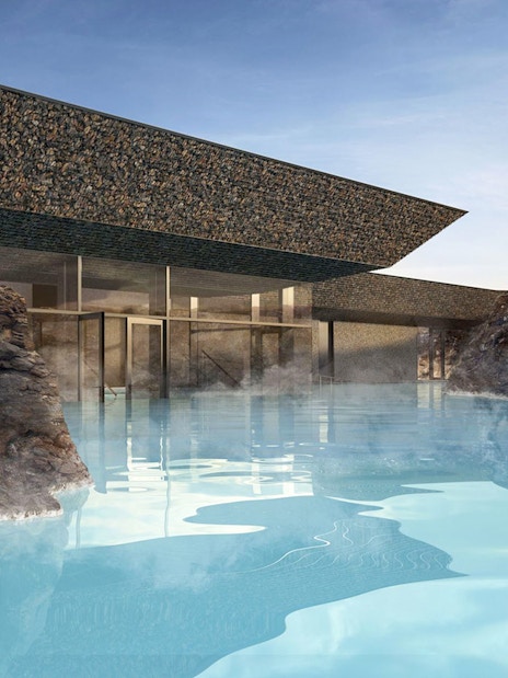 Guests relaxing in geothermal pool at Myvatn Nature Baths, Iceland.
