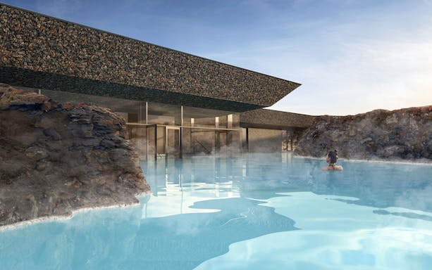 Guests relaxing in geothermal pool at Myvatn Nature Baths, Iceland.