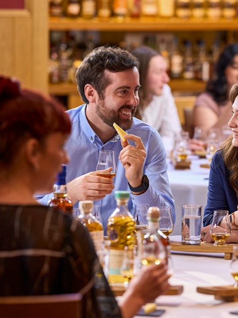 Guests enjoying whisky tasting at the Scotch Whisky Experience.