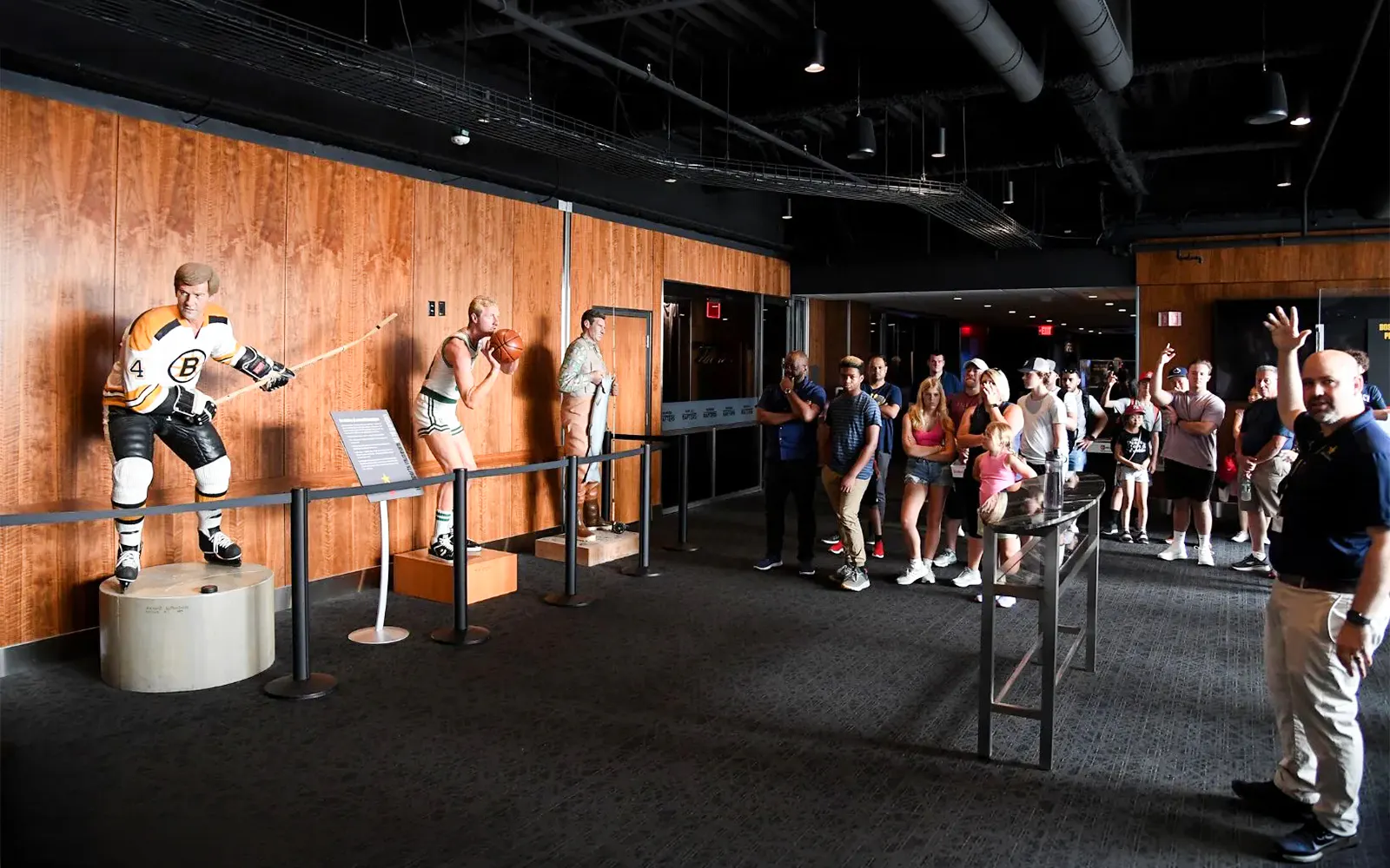 Visitors viewing sports exhibits at The Sports Museum, Boston.