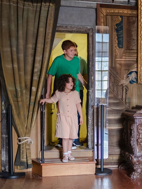 Visitors entering Mary Queen of Scots Bedchamber at the Palace of Holyroodhouse.