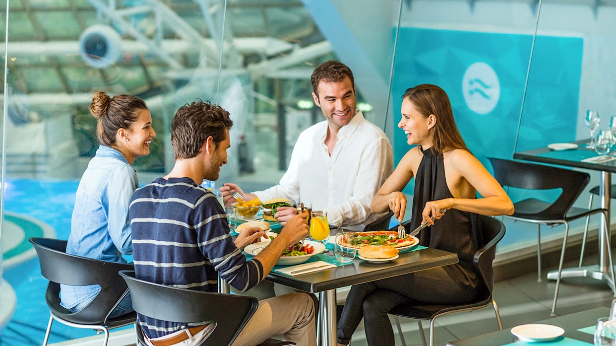 Visitors enjoying thermal baths at Caldea Spa, Andorra, with Caldea Classic Entry Tickets.