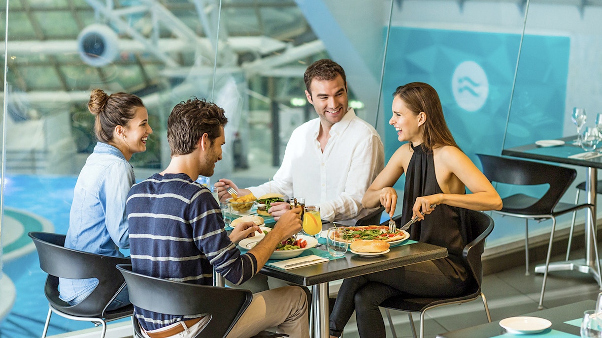 Visitors enjoying thermal baths at Caldea Spa, Andorra, with Caldea Classic Entry Tickets.
