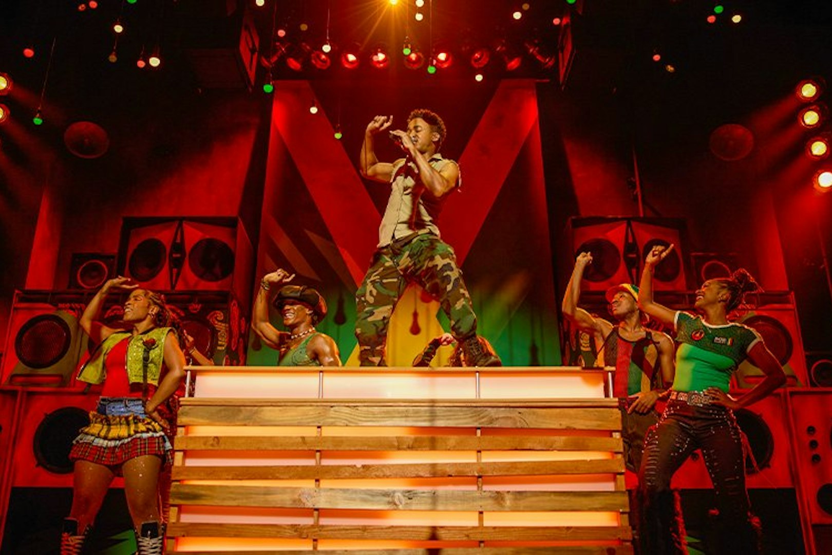 Performer and dancers on stage at Bob Marley The Show, Vegas.