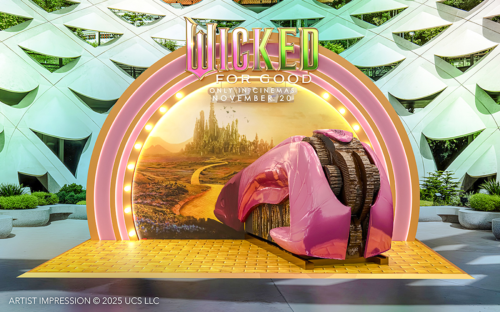 Wicked for Good display at Universal Studios Singapore featuring a pink shoe and Emerald City backdrop.