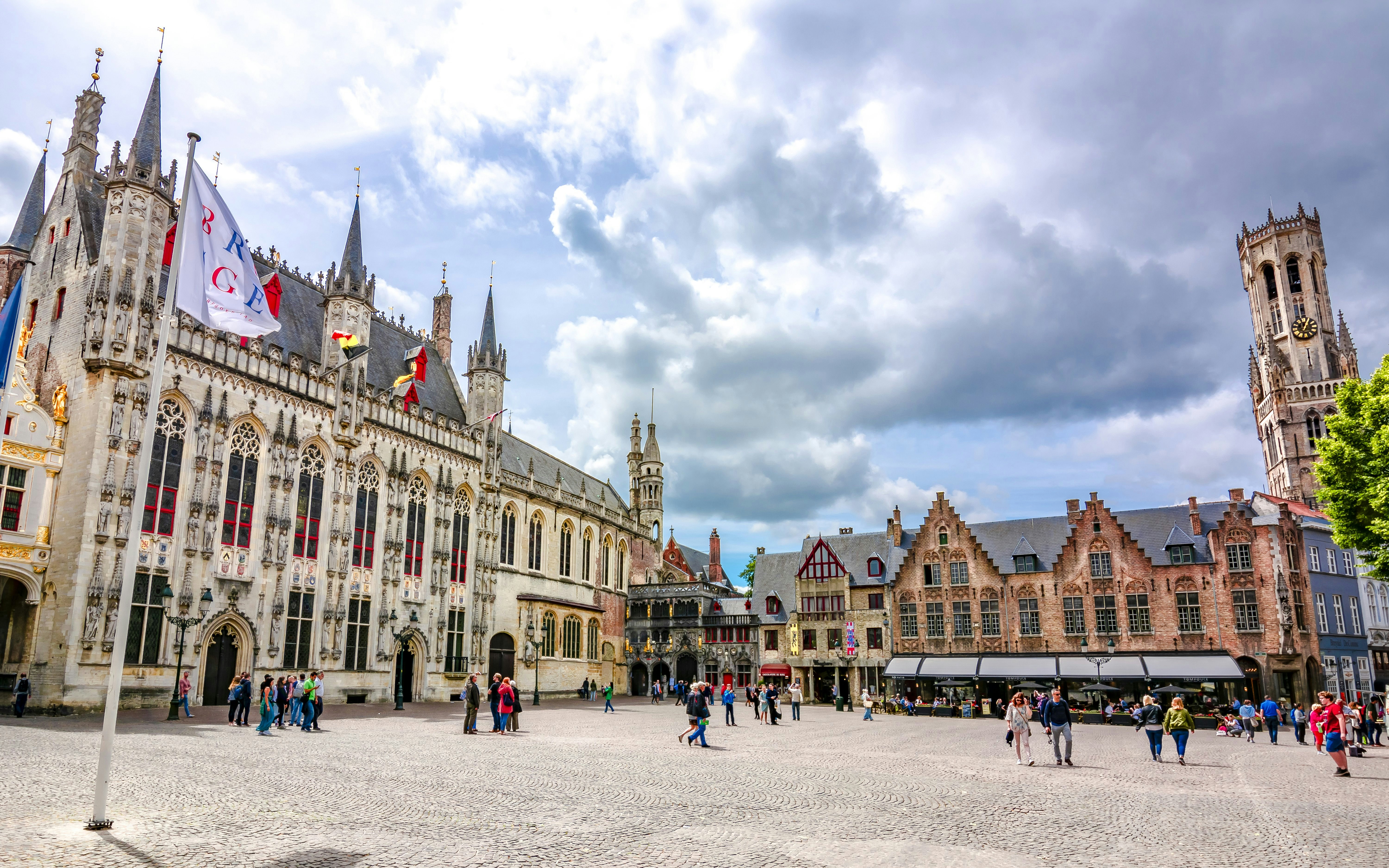 Burg Square with Town Hall, Basilica of the Holy Blood, and Belfort Tower, Bruges, Belgium.