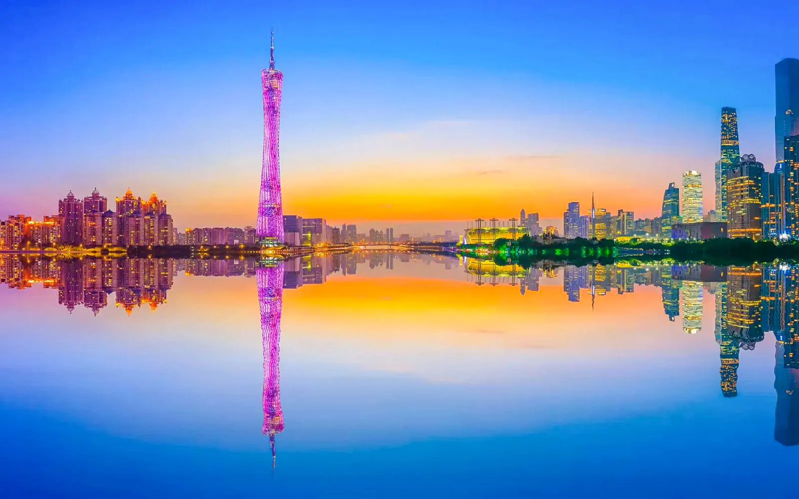 Canton Tower reflected in Pearl River at twilight, Guangzhou, China.