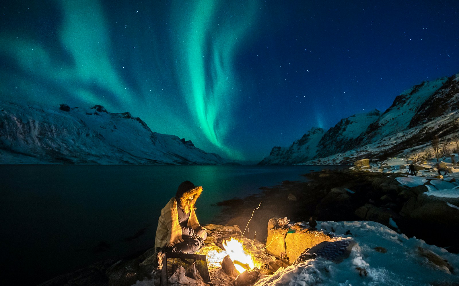 Campfire by the northern lights