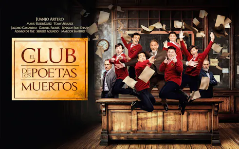 Group of people in red sweaters jumping on a desk with papers flying, related to Dead Poets Society.