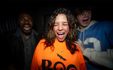 Visitors reacting in the SCarowinds Maze at Six Flags Snicker's Halloween Event.