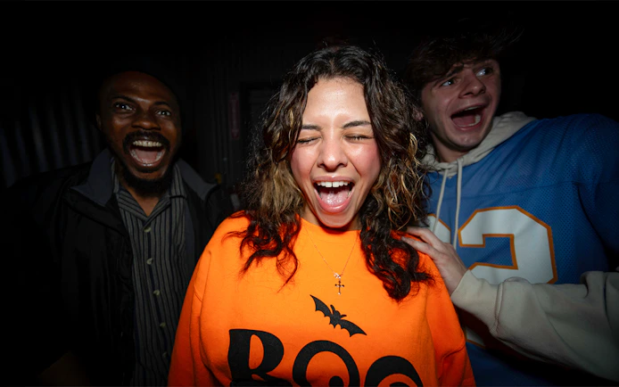 Visitors reacting in the SCarowinds Maze at Six Flags Snicker's Halloween Event.