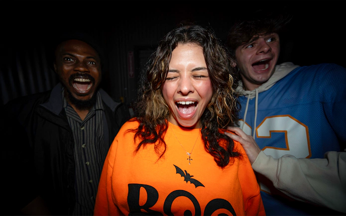 Visitors reacting in the SCarowinds Maze at Six Flags Snicker's Halloween Event.