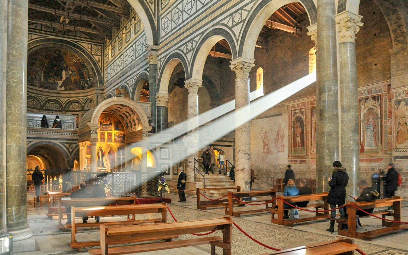 Florence Duomo Cathedral interior with intricate frescoes and architectural details.