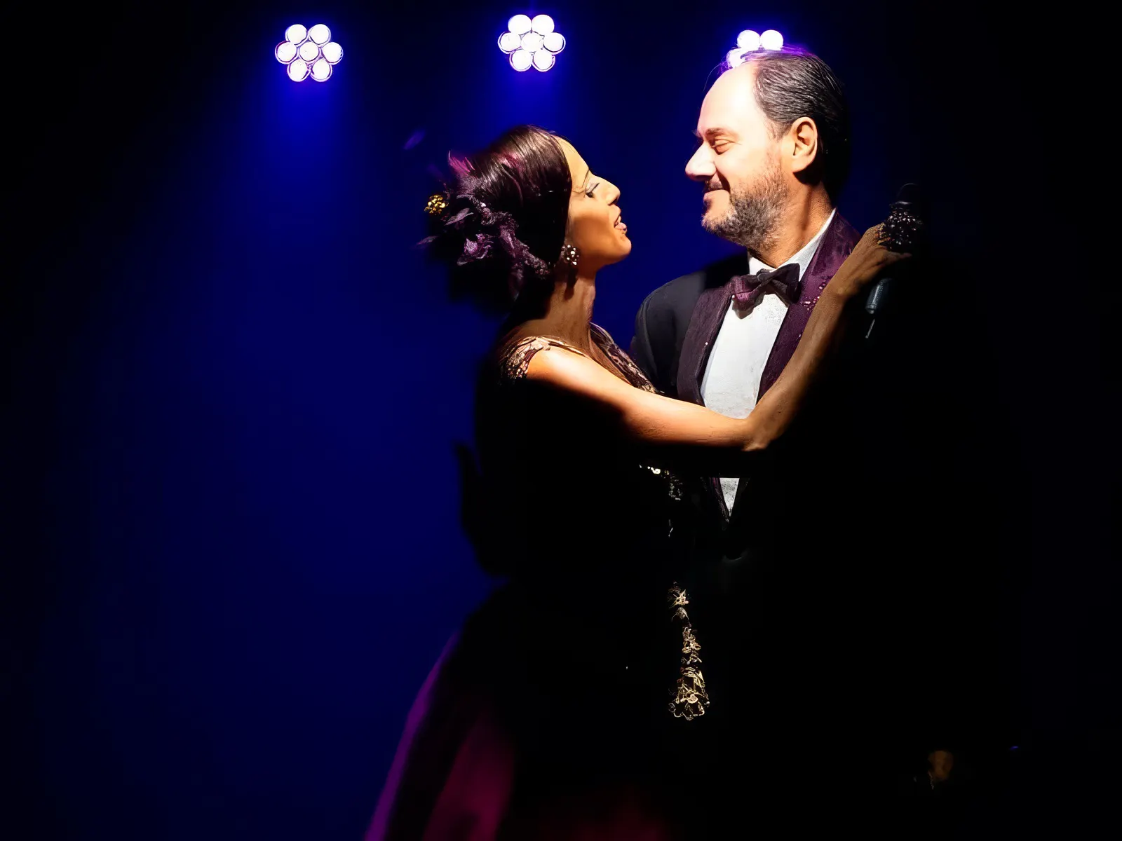 Performers dancing at Rojo Tango Show in Buenos Aires.