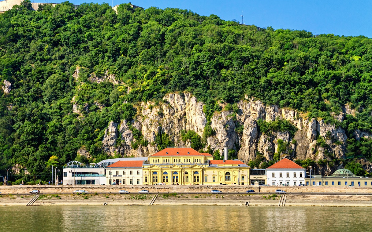Rudas Thermal Spa exterior with hillside backdrop in Budapest.