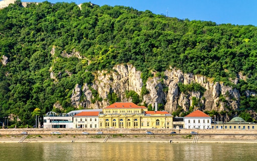 Rudas Thermal Spa exterior with hillside backdrop in Budapest.
