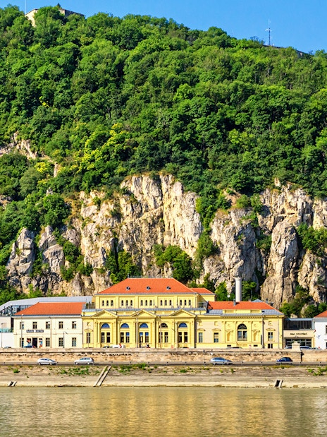 Rudas Thermal Spa exterior with hillside backdrop in Budapest.