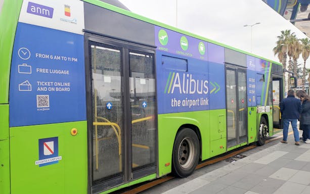 Alibus at Capodichino Airport, Naples, offering one-way tickets to city center.