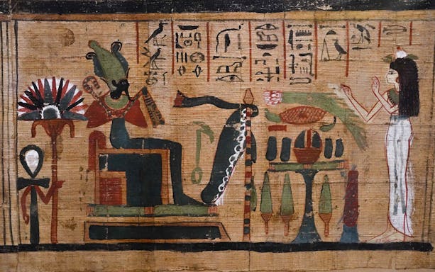 Ancient Egyptian papyrus painting with hieroglyphics and deities.