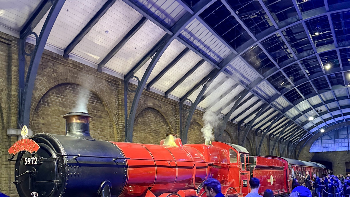 Hogwarts Express train at Platform 9 ¾, King's Cross Station, London.