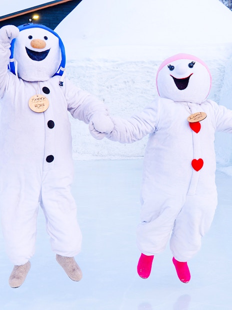 Snowmen characters jumping at Snowman World, Santa Claus Village.