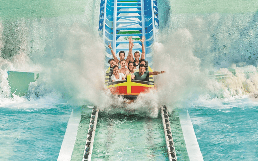 Tourists enjoying a water coaster ride at Adventure Waterpark Desaru.