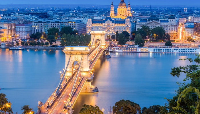 Chain Bridge and St. Stephen's Basilica illuminated at night, Budapest, Danube Cruise Christmas.