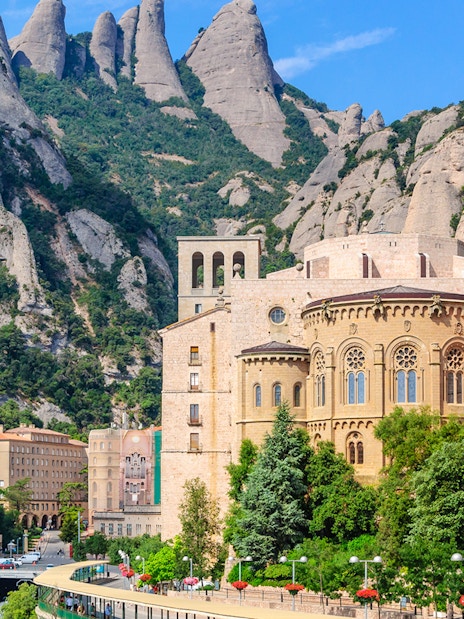 Montserrat Monastery in Catalonia's mountains, highlighting historic architecture.