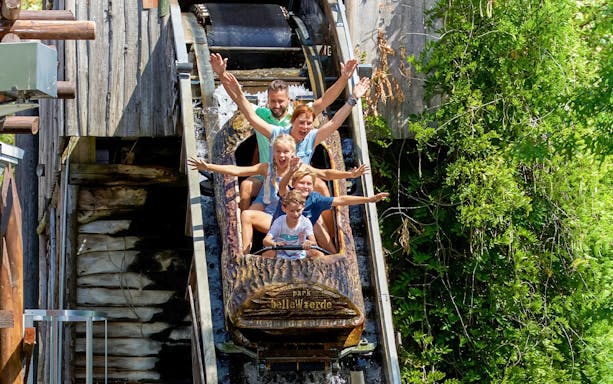 Tourists on Rio Do Cafe ride at Bellewaerde Christmas park.