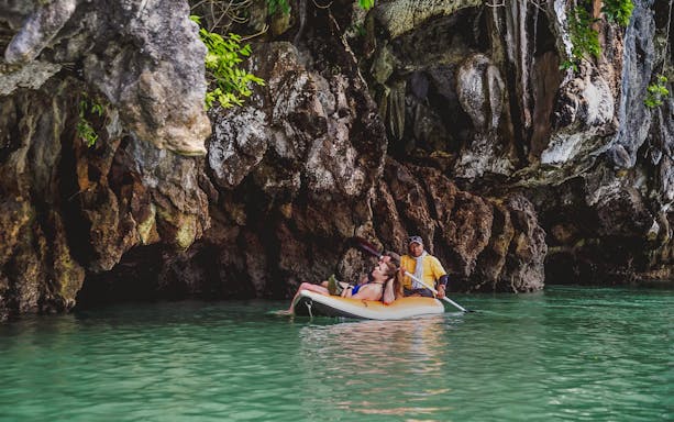 Kayaking through caves at Hong Island, Thailand.