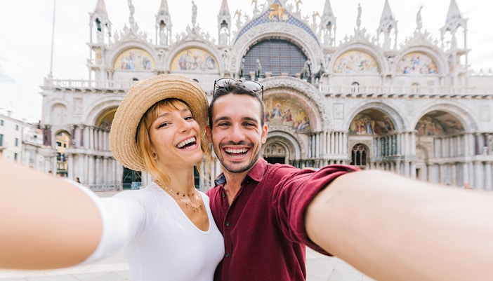 Happy people in front of st mark basilica