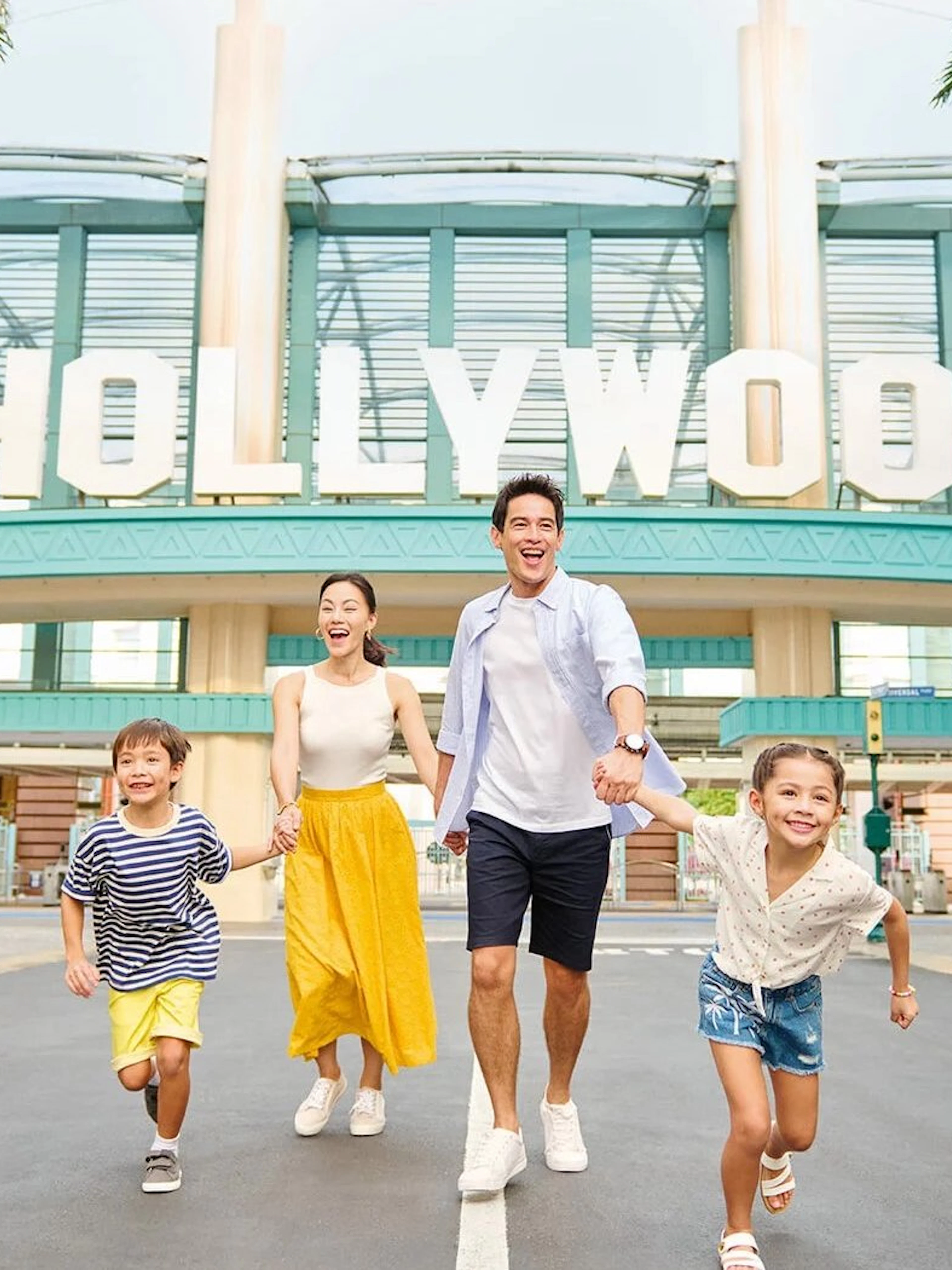 Family enjoying a day at Universal Studios Singapore's Hollywood zone.