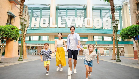 Family enjoying a day at Universal Studios Singapore's Hollywood zone.